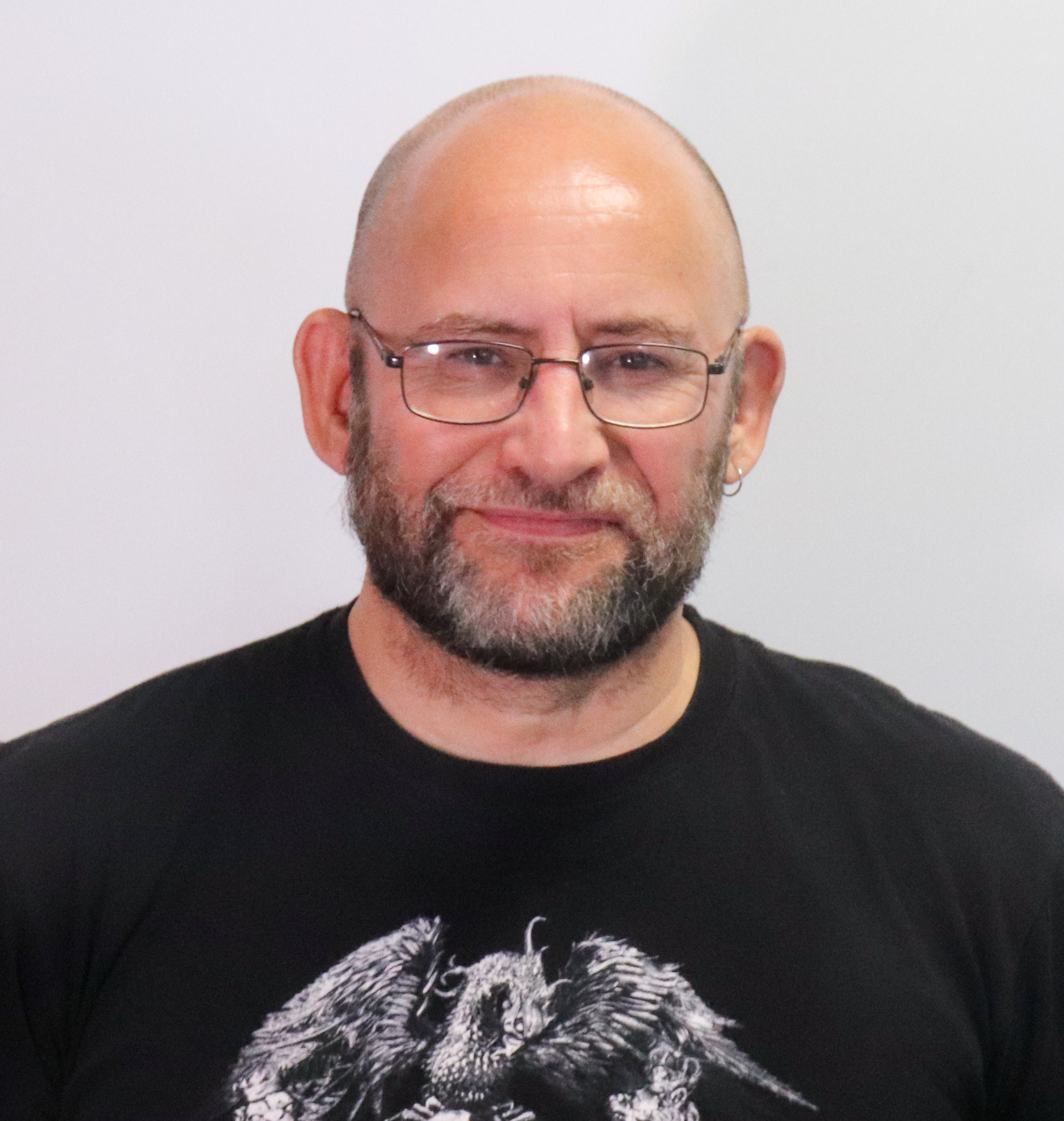 Image of the author, James Robertson, who is notoriously ecstatic to have his photo taken.  No, really - you should be glad you even get this.